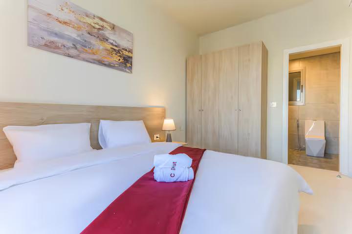 One Bedroom Suite - Bedroom with Wardrobe & Ensuite