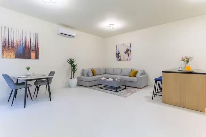 One Bedroom Suite - Dining & Living Area