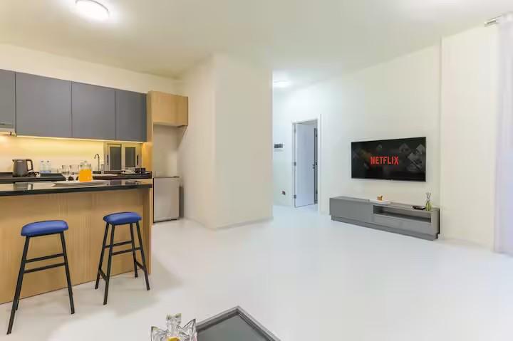 One Bedroom Suite - Kitchen & Entertainment Area