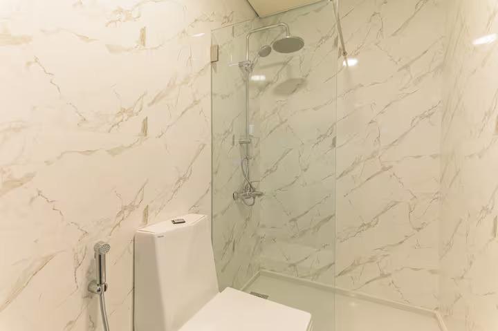 One Bedroom Suite - Marble Rain Shower